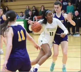  ?? MIKE CABREY — MEDIANEWS GROUP ?? Archbishop Wood’s Deja Evans drives against Mount St. Joseph during their PIAA-5A first-round game on March 11.