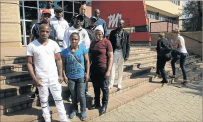  ??  ?? Disgruntle­d fighters who were left stranded without food and transport in Thohoyando­u, after their tournament was cancelled on Friday, visited the Sowetan’s offices yesterday. They include Moruti Mthalane, front row left, Melissa Miller and Ndobayini Kolosa.