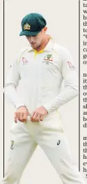  ??  ?? No hiding place: Cameron Bancroft engages in his failed act of skuldugger­y