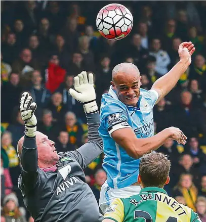  ?? — AFp ?? Wanted man: Manchester City’s Vincent Kompany (top) has not played since injuring his knee against Dynamo Kiev on March 15.