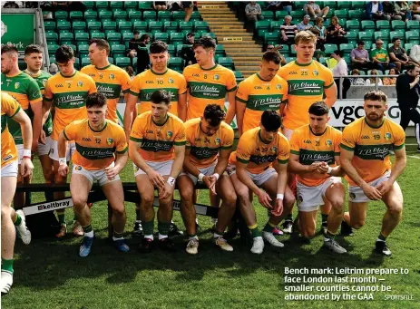  ?? SPORTSFILE ?? Bench mark: Leitrim prepare to face London last month — smaller counties cannot be abandoned by the GAA