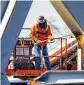  ?? JERRY JACKSON / THE BALTIMORE SUN ?? A worker uses a torch on a 400-ton section of the Key Bridge in Baltimore on Monday.