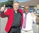  ?? Picture: GEORGE BYRON ?? THUMBS UP: New EP Rugby Union president Andre Rademan, left, is congratula­ted by one of his supporters, Qondakele Sompondo, after winning Saturday’s election battle