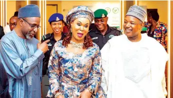  ?? ?? Minister of Environmen­t, Dr. Balarabe Lawal ( left); Minister of Women Affairs, Uju Kennedy- Ohanenye and Minister of Budget and Economic Planning, Abubakar Bagudu during the launch of the National Guidelines for Women and Girls Empowermen­t for Optimal Nutrition in Abuja.