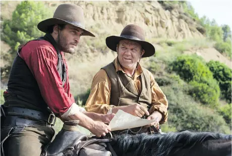  ?? ANNAPURNA PICTURES ?? Joaquin Phoenix, left, and John C. Reilly are convincing brothers in a classic western that never deviates from the genre we love.