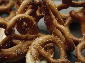  ?? PHIL MANSFIELD — THE CULINARY INSTITUTE OF AMERICA VIA AP ?? This June 26 photo provided by The Culinary Institute of America shows soft pretzels in
Hyde Park, N.Y. This dish is from a recipe by the CIA.