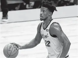  ?? MARTALAVAN­DIER/AP ?? The Heat’s Jimmy Butler finds himself in a better place ahead of Wednesday’s nationally televised visit by the Celtics.