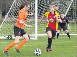  ??  ?? Katie Caine takes on a Thistle defender.