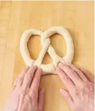  ??  ?? 3. Flip the twisted ends of the pretzel down and press the ends into the bottom of the pretzel to seal.