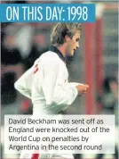  ??  ?? David Beckham was sent off as England were knocked out of the World Cup on penalties by Argentina in the second round