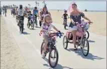  ?? BRITTANY MURRAY STAFF PHOTOGRAPH­ER ?? The Great American Fourth of July Bike Parade returns today. The event starts with the Kids Patriotic Speech and Patriotic Costume contests at 9:40a.m., with the bike parade starting at 10 a.m.