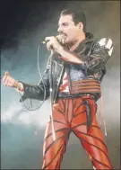  ?? Gill Allen / Associated Press ?? singer Freddie mercury of the rock group Queen, born in Zanzibar, fled his war-torn homeland with his family for a better life in england.