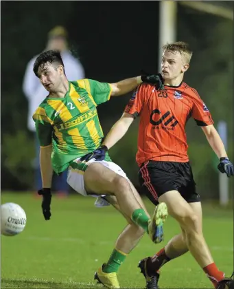  ??  ?? Shane Hickey, Mattock Rangers, and Craig Callan, Clan na Gael, battle during the IFC semi-final.