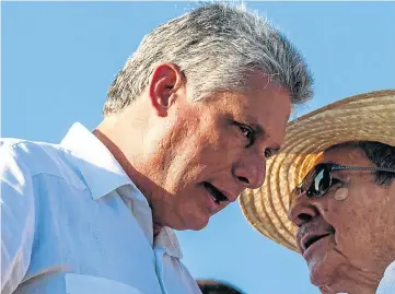  ?? Pictures: Gallo/Getty ?? Cuba’s new President Miguel Díaz-Canel, left, with his predecesso­r, Raúl Castro. The two were photograph­ed while watching a May parade in Havana in 2016 to celebrate the 90th birthday of Fidel Castro, who died six months later.