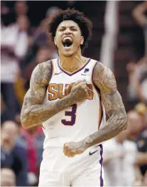  ?? AP FOTO ?? ON FIRE. Phoenix Suns forward Kelly Oubre thumps his chest after forcing a turnover. He was sizzling hot on the floor with 27 points to lead the Suns to an upset win over the Milwaukee Bucks.