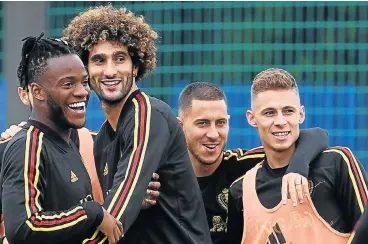  ?? /AFP ?? Final on their mind: Belgium footballer­s, from left, Michy Batshuayi, Marouane Fellaini, Eden Hazard and Thorgan Hazard relax during a training session ahead of their World Cup semifinal against France on Tuesday.