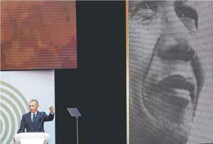  ?? Marco Longari, Getty Images ?? Former U.S. President Barack Obama speaks during the annual Nelson Mandela Lecture at the Wanderers cricket stadium in Johannesbu­rg on Tuesday.