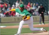  ?? JOHN MEDINA ?? Oakland A's pitcher Shintaro Fujinami delivers a pitch during a spring training game against the Los Angeles Angels at Hohokam Stadium on Tuesday in Mesa, Arizona.