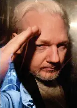  ??  ?? Extraditio­n fight: Julian Assange on his way to Belmarsh in a prison van