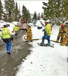  ?? Photo by Maurice Cooper, Eastern Sierra Now ?? Roads are blocked as emergency service personnel respond to the incident.