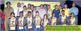  ??  ?? The winners and runners up of the four events posing for a picture with Chief Guest Akila Viraj Kariyawasa­m, Minister of Education and officials