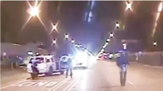  ??  ?? Laquan McDonald walks down the street moments before being fatally shot by CPD Officer Jason Van Dyke.
