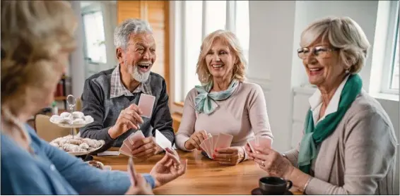  ?? ADOBE STOCK PHOTO ?? Social engagement is an important part of a holistic approach to wellness for seniors.