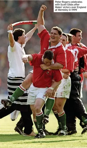  ?? ?? Peter Rogers celebrates with Scott Gibbs after Wales’ victory over England at Wembley in 1999