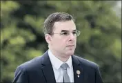  ?? Bill Clark CQ Roll Call ?? REP. JUSTIN AMASH has said behavior by Trump laid out in the Mueller report may be impeachabl­e.