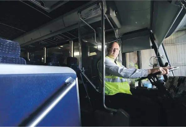  ?? MICHELLE BERG ?? Bob Clouatre is one of the longest-serving Saskatchew­an Transporta­tion Company drivers, with more than 38 years of service. The bus service shuts down Wednesday.