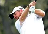  ?? PHELAN M. EBENHACK/THE ASSOCIATED PRESS ?? Shane Lowry tees off on the 11th hole during the first round of the Arnold Palmer Invitation­al on Thursday in Orlando, Fla.