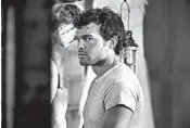  ??  ?? Alden Ehrenreich plays John the Savage in “Brave New World,” a Peacock series based on Aldous Huxley’s novel.