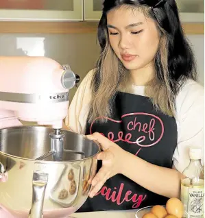  ?? ?? Cailey Salonga in the kitchen