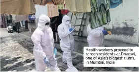  ??  ?? Health workers proceed to screen residents at Dharavi, one of Asia’s biggest slums, in Mumbai, India