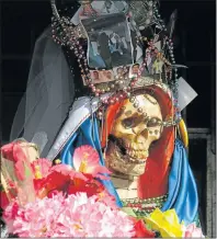  ??  ?? FAST-GROWING RELIGION: A depiction of Our Lady of Holy Death