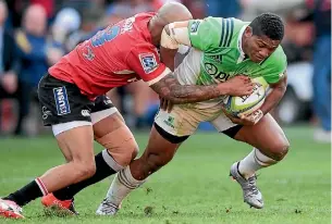  ?? PHOTO: GETTY IMAGES ?? Lionel Mapoe of the Lions tackles Waisake Naholo of the Highlander­s during the Super Rugby semifinal in Johannesbu­rg.