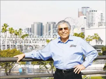  ?? Dania Maxwell Los Angeles Times ?? JIM MICHAELIAN has been with the Grand Prix Assn. of Long Beach since before its first race in 1975 and assumed the top post in 2001. He oversees a staff of 15 that swells to more than 2,000 on race weekend.