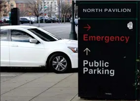  ?? AP PHOTO BY JAY REEVES ?? A car pulls into the emergency room entrance at UAB Hospital in Birmingham, Ala., on Wednesday, Jan. 5, 2022. On Friday, Jan. 28, The Associated Press reported on stories circulatin­g online incorrectl­y claiming vaccines only reduce hospitaliz­ations in the U.S., not in other countries.