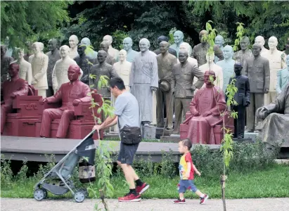  ?? Helen Davidson/ the Observer ?? ABOVE Banished dictator statues look down on Cihu park..