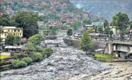  ?? PTI ?? Beas river in spate after heavy rain in Himachal Pradesh’s Kullu district on Monday.