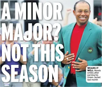  ??  ?? WEARS IT WELL Woods smiles after earning his Green Jacket last month