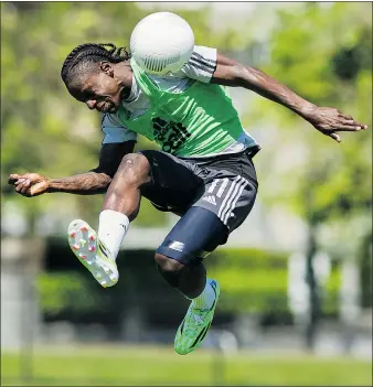  ?? GERRY KAHRMANN/PNG ?? Whitecaps forward Darren Mattocks heads the ball during practice at the University of B.C. in Vancouver on Tuesday.