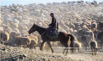  ?? ?? Kazakh people traditiona­lly lived by herding in the Altai region