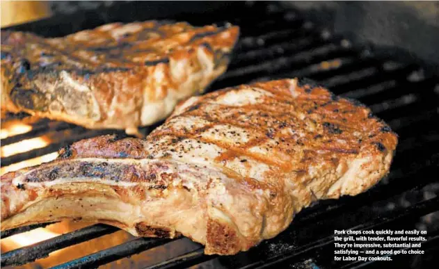  ?? DREAMSTIME ?? Pork chops cook quickly and easily on the grill, with tender, flavorful results. They’re impressive, substantia­l and satisfying — and a good go-to choice for Labor Day cookouts.