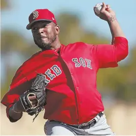  ??  ?? LET IT FLY: Reliever Fernando Abad delivers a pitch yesterday in Fort Myers.