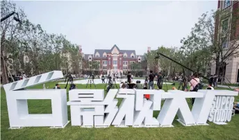  ??  ?? A reality show is shot at the Dachang Movie Town