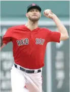  ?? ELISE AMENDOLA/AP ?? Red Sox left-hander Chris Sale broke his own AL record Friday by reaching 200 strikeouts in 136 innings.