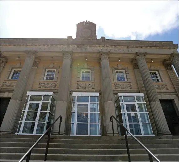  ?? STUART CAHILL / HERALD STAFF ?? ‘PROVIDE CLOSURE’: The West Roxbury District Courthouse is pictured yesterday in Boston.