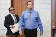  ?? ERIC BONZAR — THE MORNING JOURNAL ?? Curtis Longbrake, 32, right, approaches the bench of Lorain County Common Pleas Judge Christophe­r R. Rothgery for sentencing June 28. Longbrake, with his attorney Kenneth Crislip, was sentenced to four months in jail and ordered to serve three years of...
