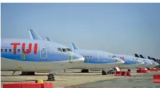 ?? FOTO: ERIC LALMAND/BELGA/DPA ?? Wann die Tui-Maschinen wieder abheben können und welche Ziele der Reisekonze­rn dann anfliegen wird, ist derzeit noch unklar.